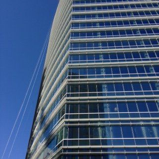 A tall building with a blue sky in the background