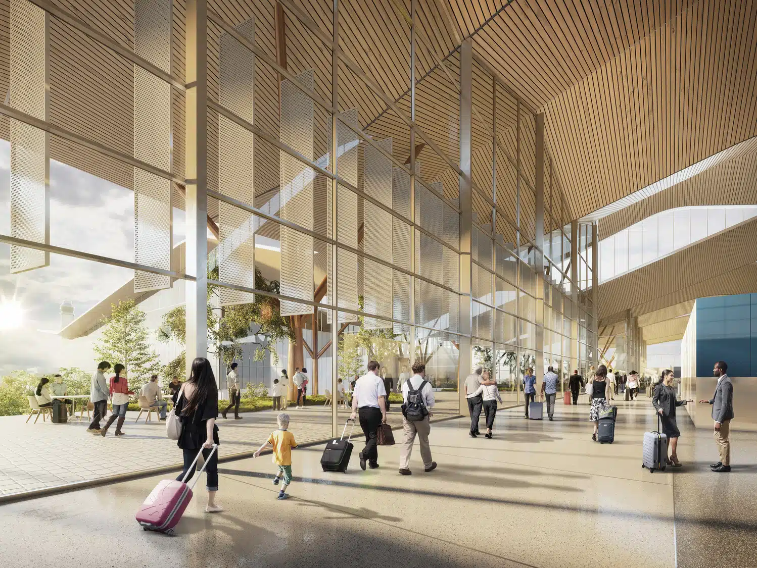 A group of people are walking through an airport terminal.