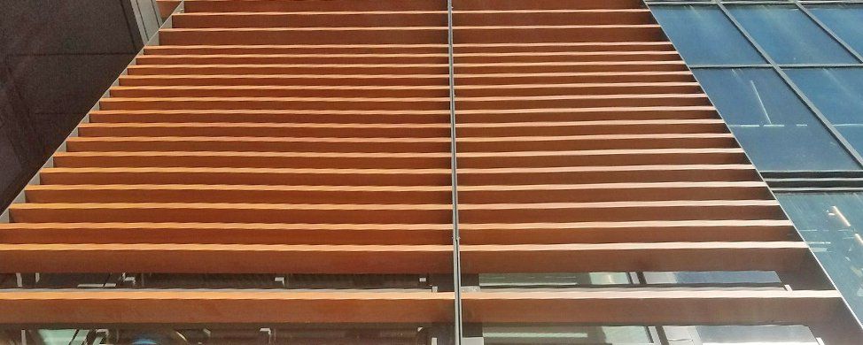 A wooden structure is being built on top of a building