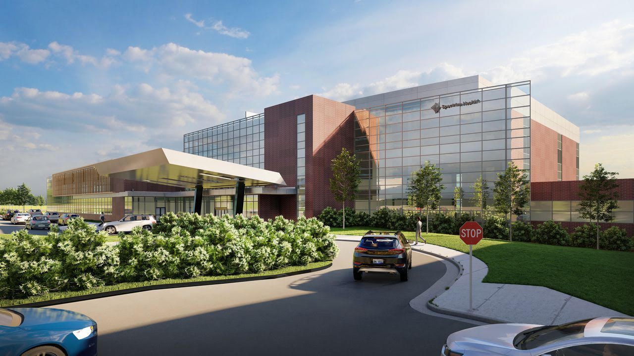An artist 's impression of a new building with cars parked in front of it.