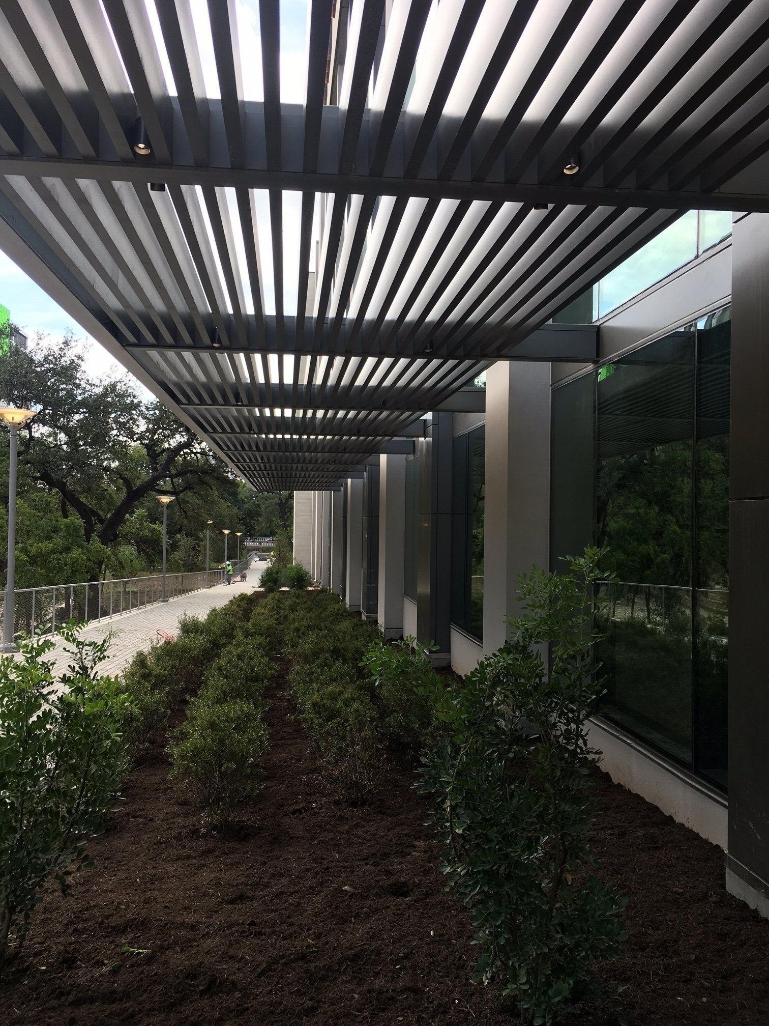 A building with a pergola on top of it