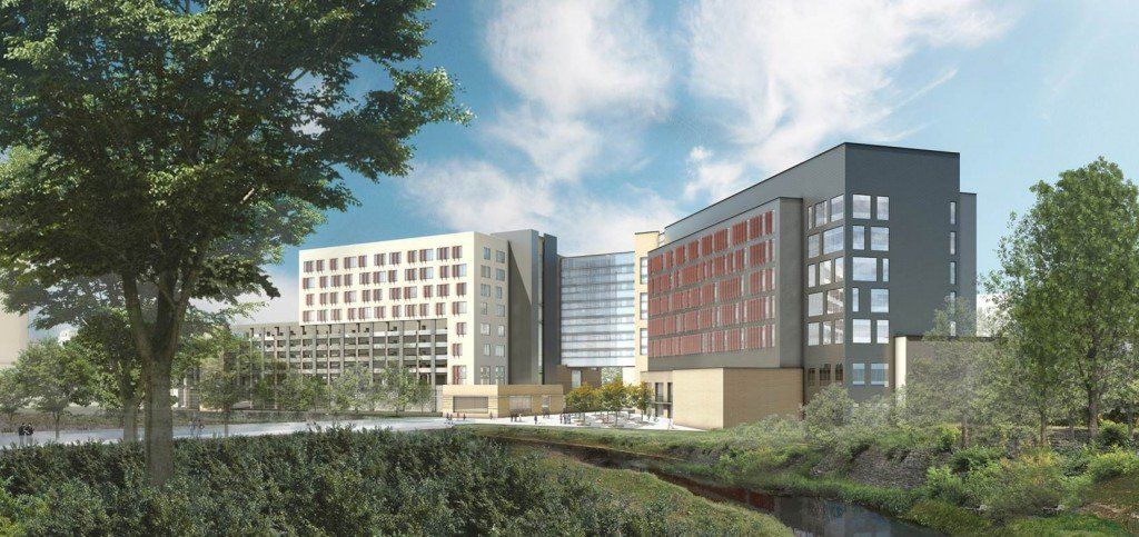 An artist 's impression of a large building surrounded by trees