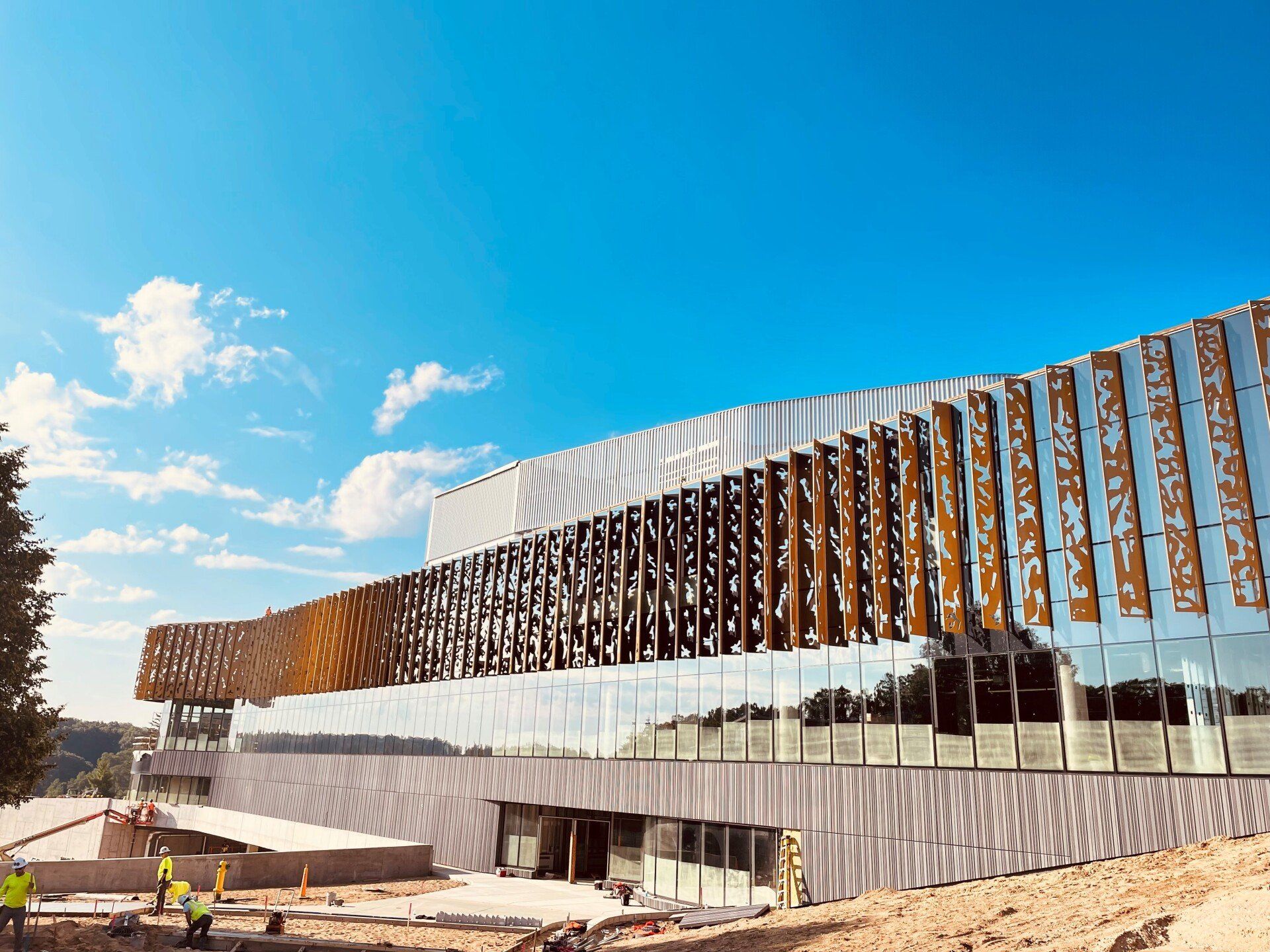 A large building with a lot of windows is being built.