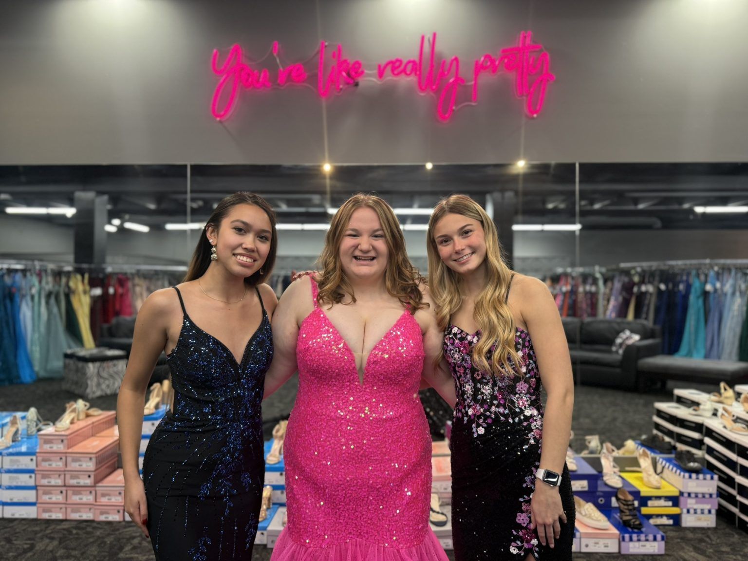 Bride and groom kissing, groom dipping bride on a street, autumn setting.