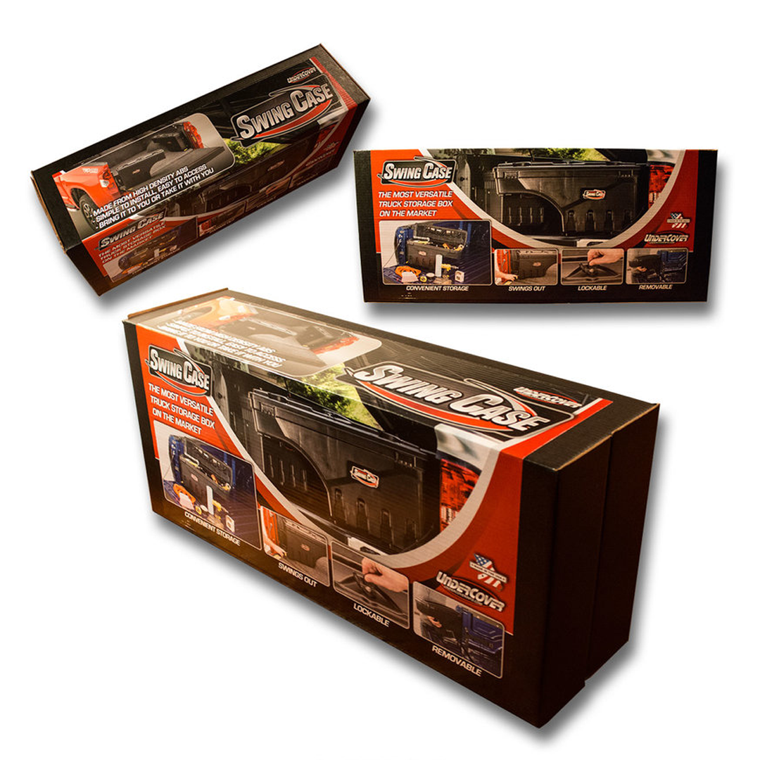 Three boxes are sitting next to each other on a white background