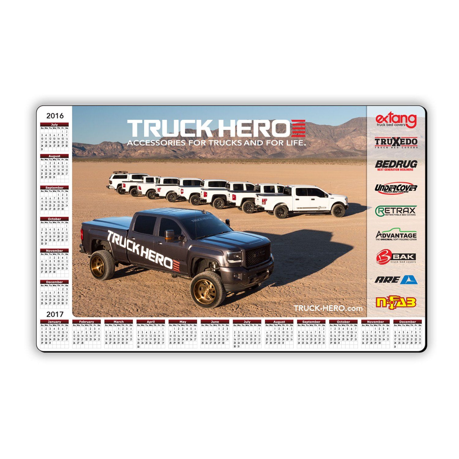 A calendar with a picture of a row of trucks on it.