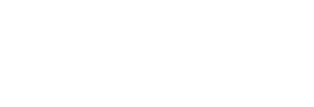 Logo for Woodcreek Apartments: a dark green pine tree next to the words "WOODCREEK APARTMENTS".