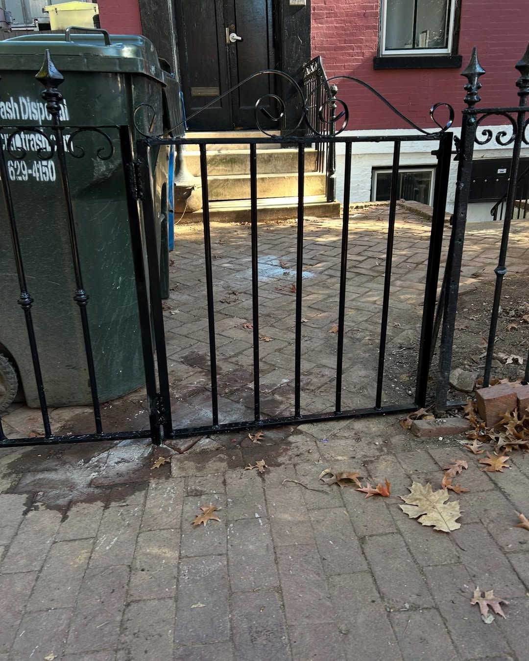 A green trash can with the number 912-904 on it