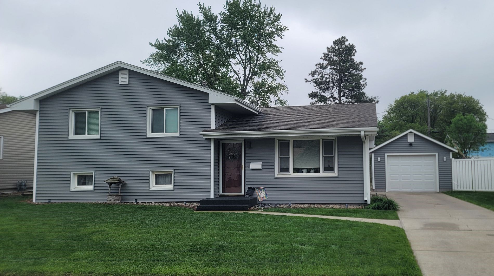 Gray Siding of the House — Omaha, NE — Done Right Home Improvements, Inc.