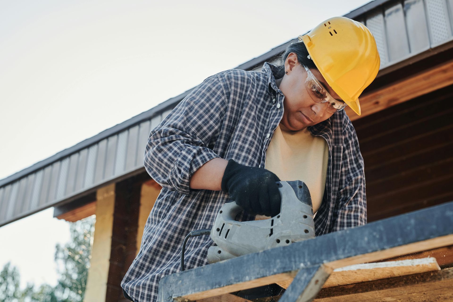 Woman Wearing a Hard Hat and Safety Glasses — EyeMax EyeCare in Singleton, NSW