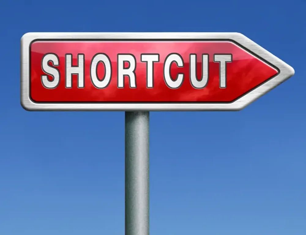 A red sign with the word shortcut on it