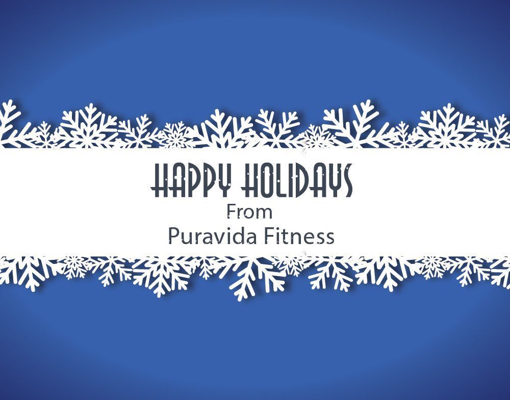 A blue background with snowflakes and the words happy holidays from puravida fitness