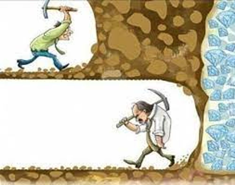 A cartoon of a man holding a pickaxe and a man walking through a tunnel filled with diamonds.