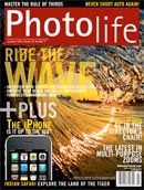 the cover of a photolife magazine with a picture of a wave on it .