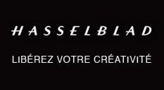 the hasselblad logo is on a black background .