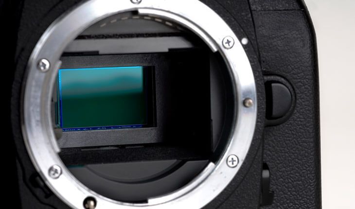 a close up of the inside of a camera with a green screen .
