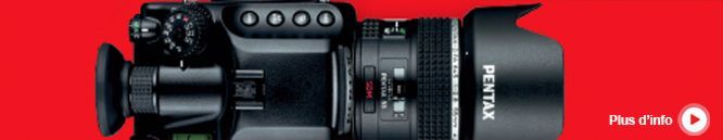 a pentax camera is shown on a red background