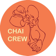 An orange circle with the words chai crew on it