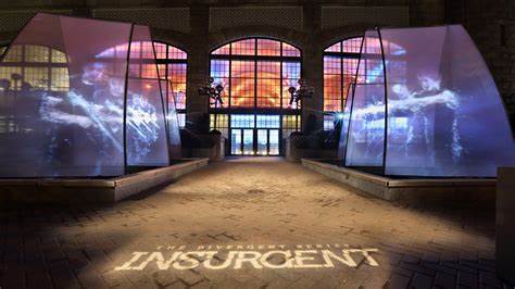 The word insurgent is written on the floor of a building.