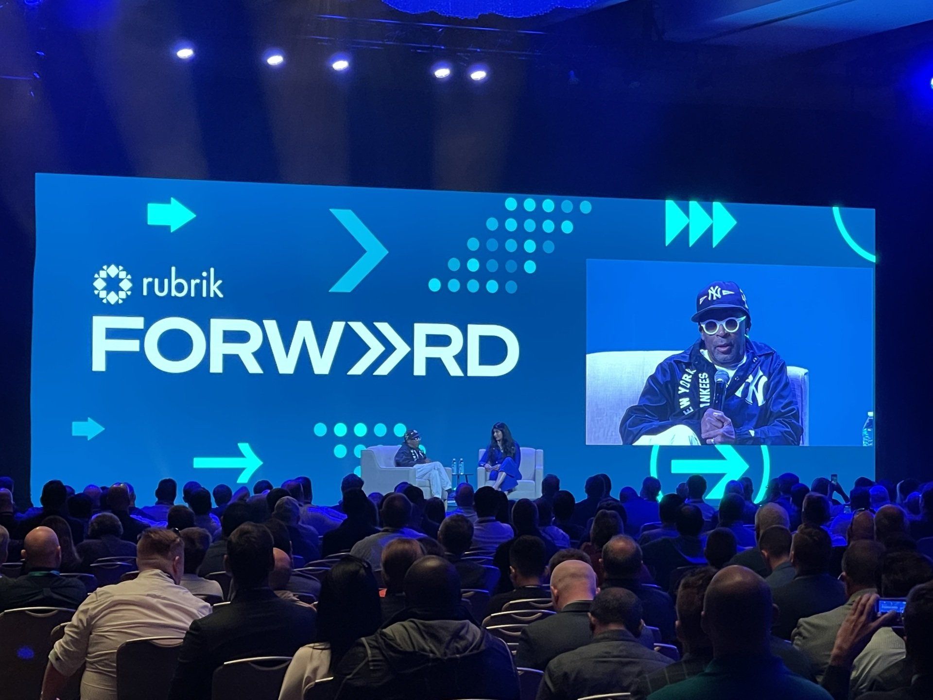 A large screen with the word forward on it