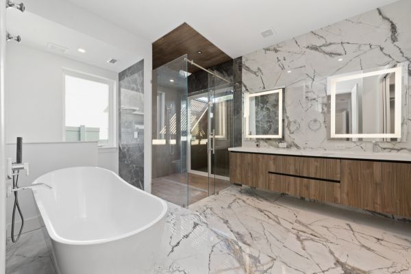 There is a bathtub in the middle of the bathroom.