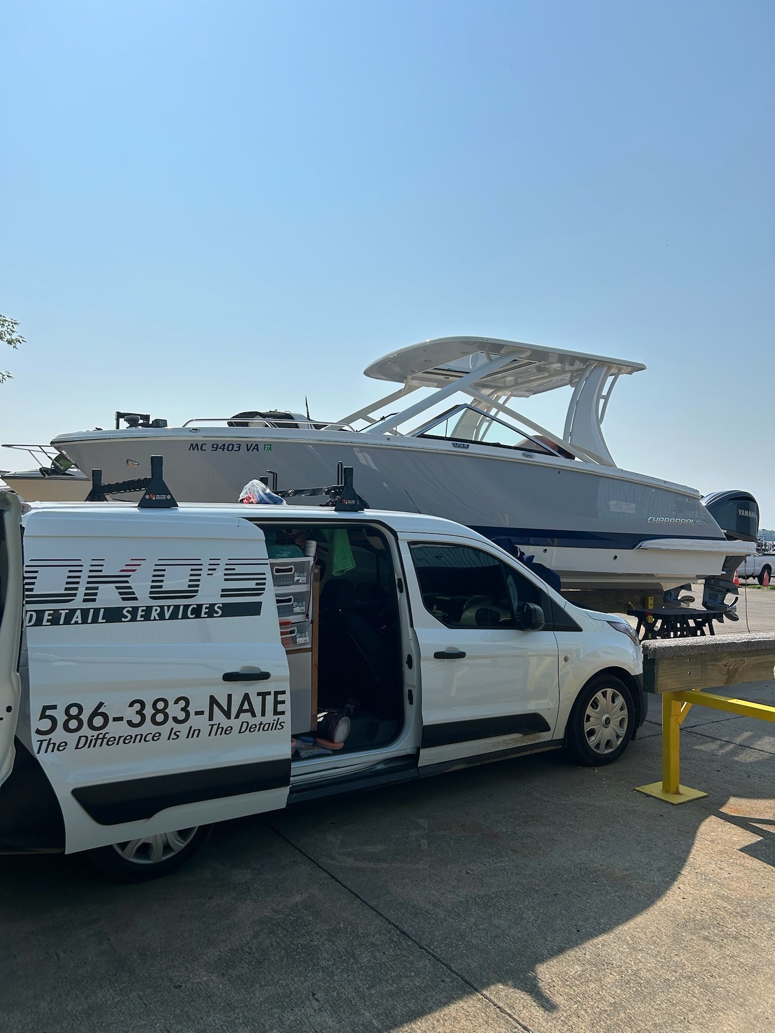 A boat is sitting on top of a trailer in a garage.
