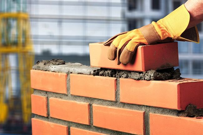 Person Building Brick Walls