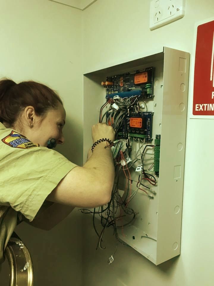 Electrician At Work On An Electrical Panel — John B Electrical In Wooragee VIC