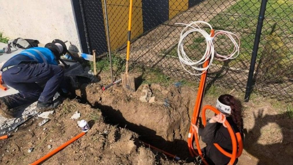 Two Electricians Installing Cables