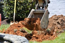 Digging hole foundation ongoing in a residential excavation project of a home property in Wollongong NSW.