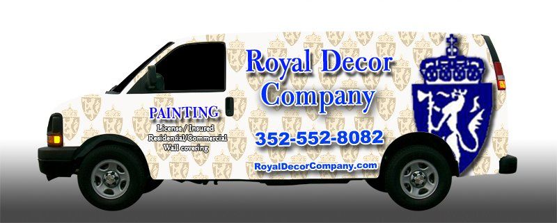 A white van that says royal decor company on the side