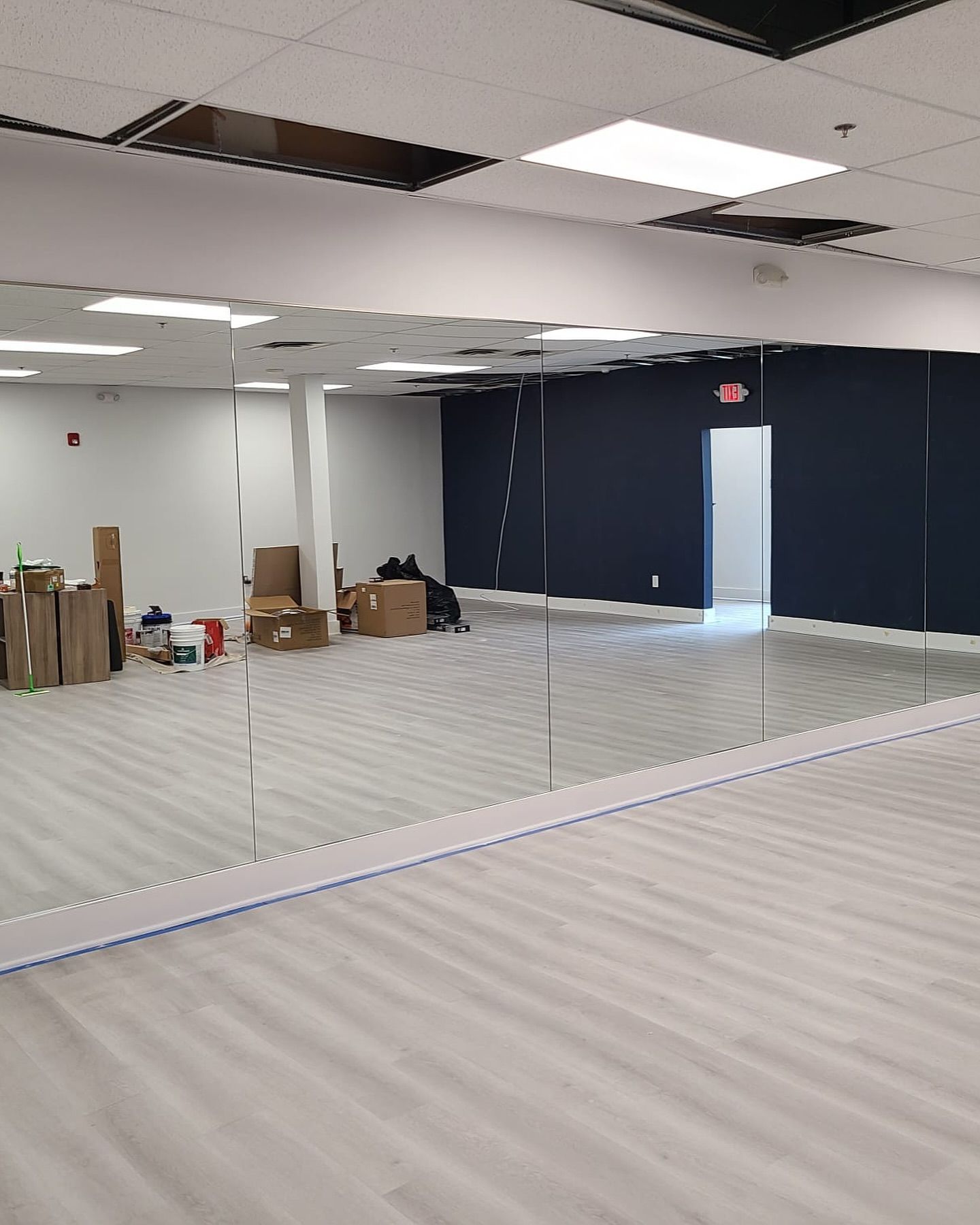 There is a large mirror in the middle of the room.