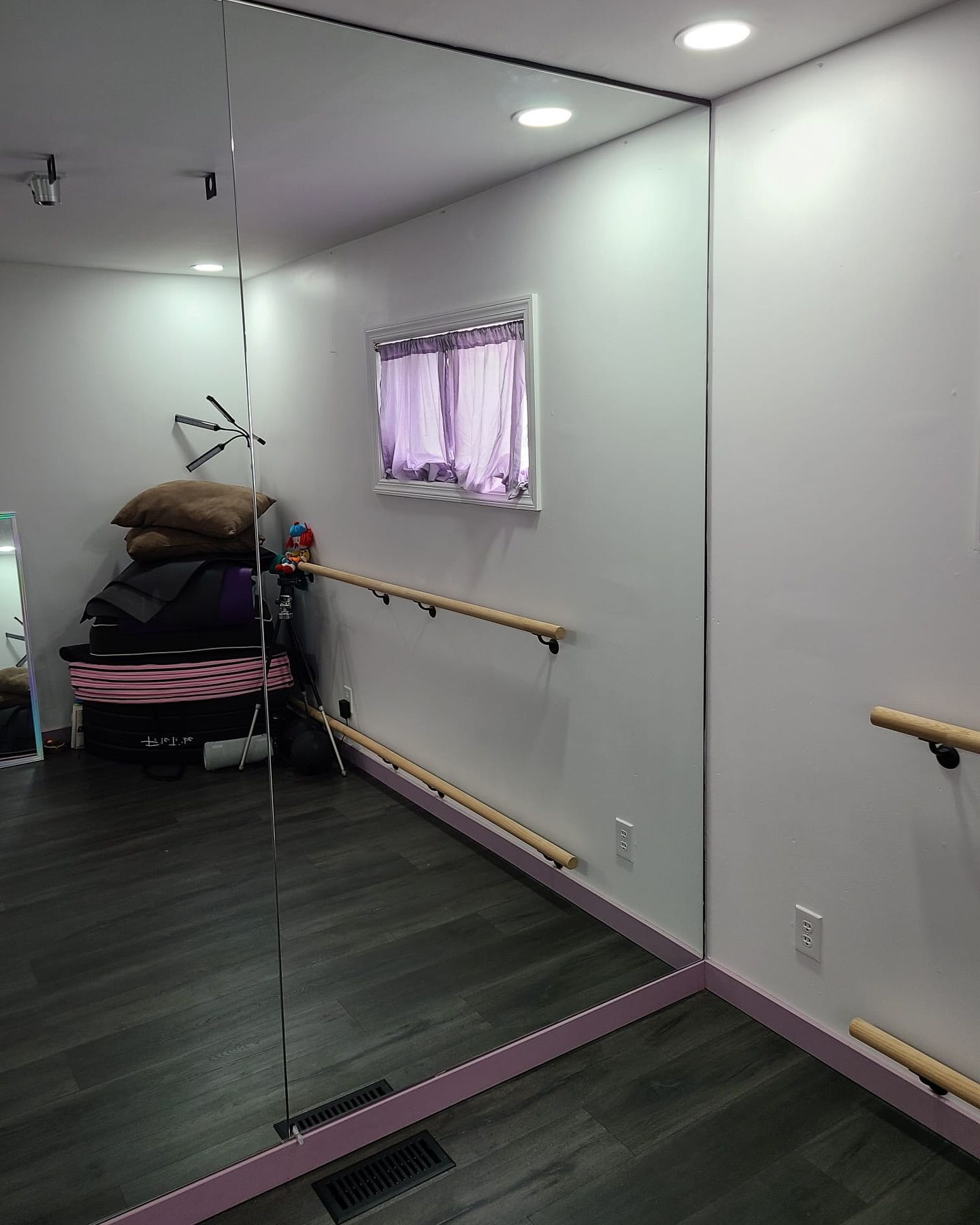 There is a large mirror in the middle of the room.