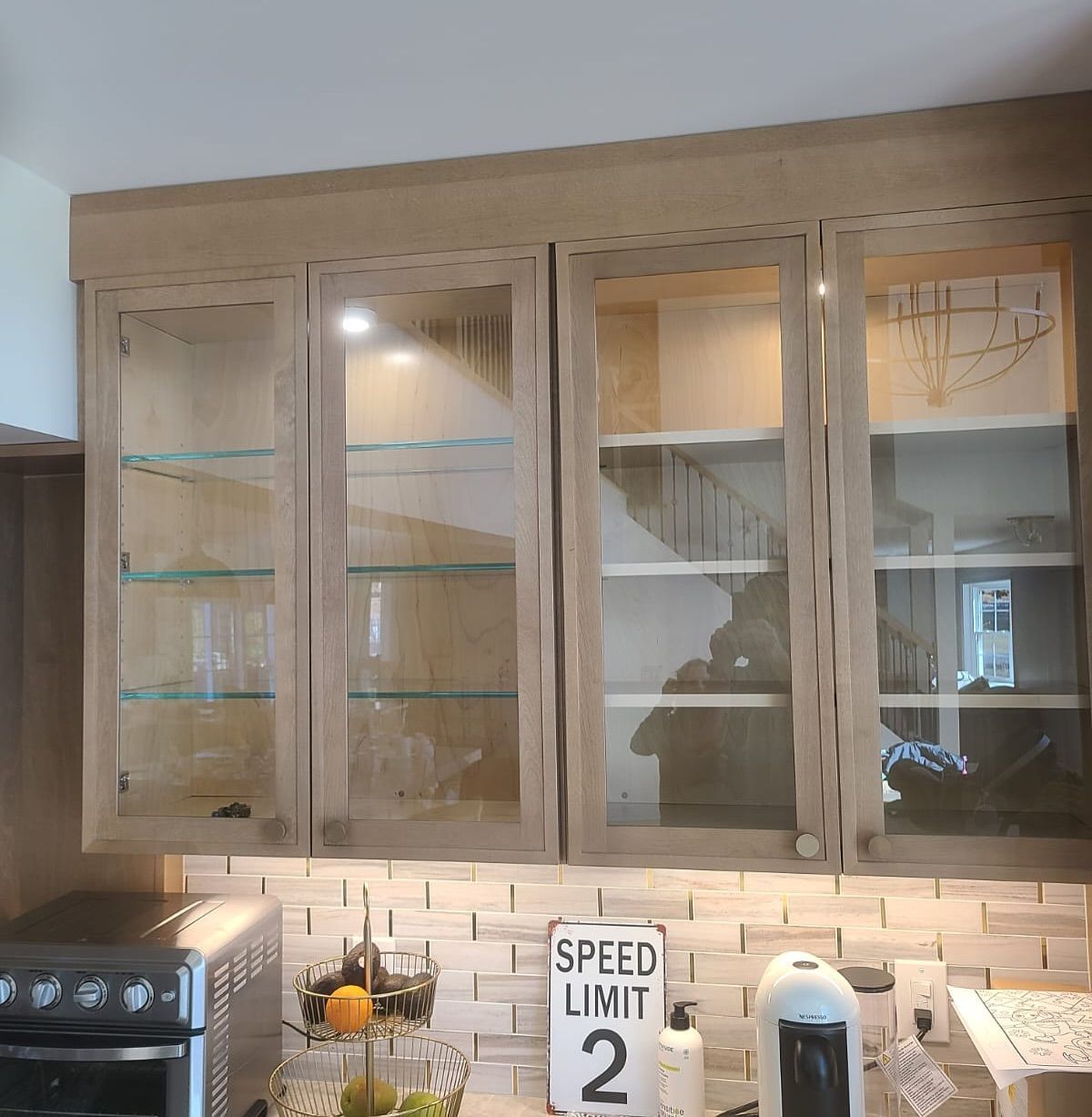 A kitchen with a sign that says speed limit 2