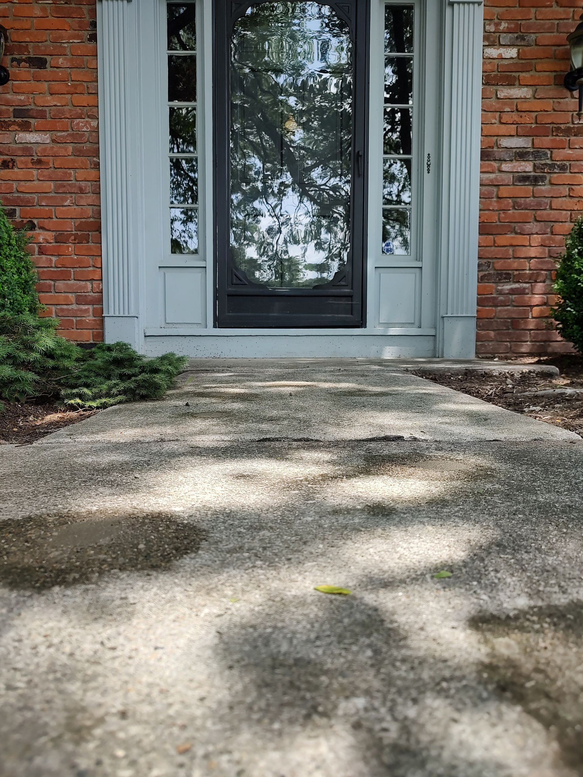 Irwin Concrete Leveling - After Concrete Leveling we reduced the slope on the porch and restored the slope on the sidewalk. The trip hazards were removed.