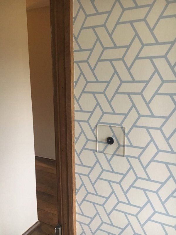 Blue and white geometric wallpaper