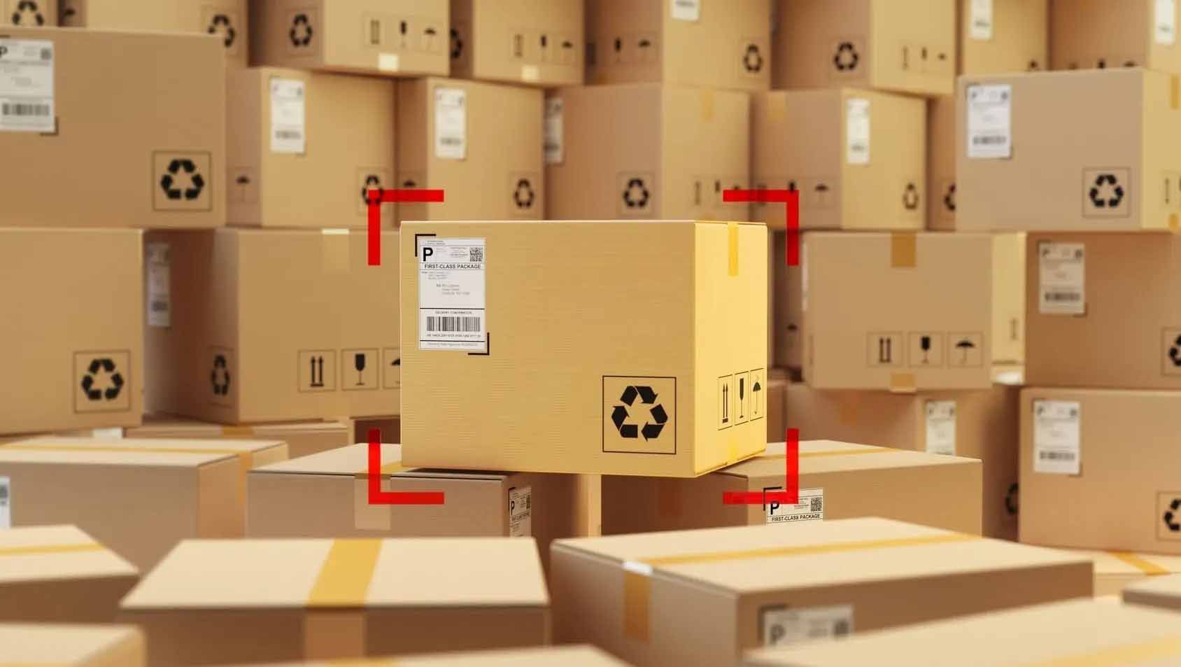 A bunch of cardboard boxes are stacked on top of each other in a warehouse.