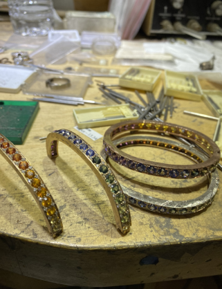 A bunch of bracelets are sitting on a table