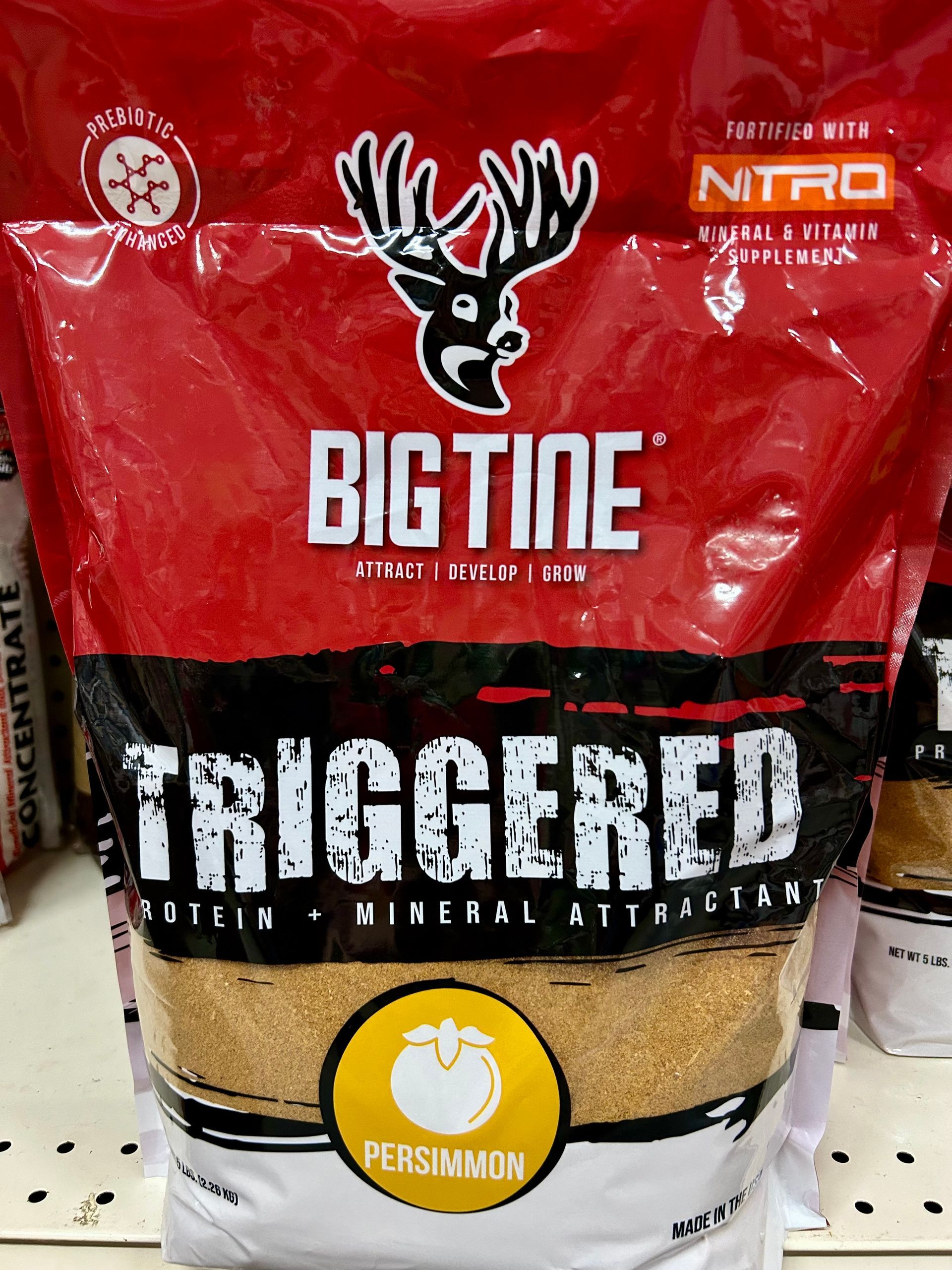 A bag of big tine triggered persimmon sits on a shelf