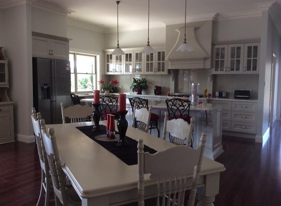 White Dining Table in the Kitchen — Kitchen Renovations in Tamworth, NSW