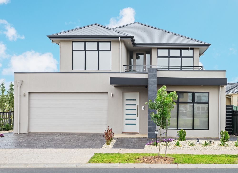 A Large House With A Garage And A Balcony — Settle Petal Mobile Conveyancing In Diamond Beach, NSW