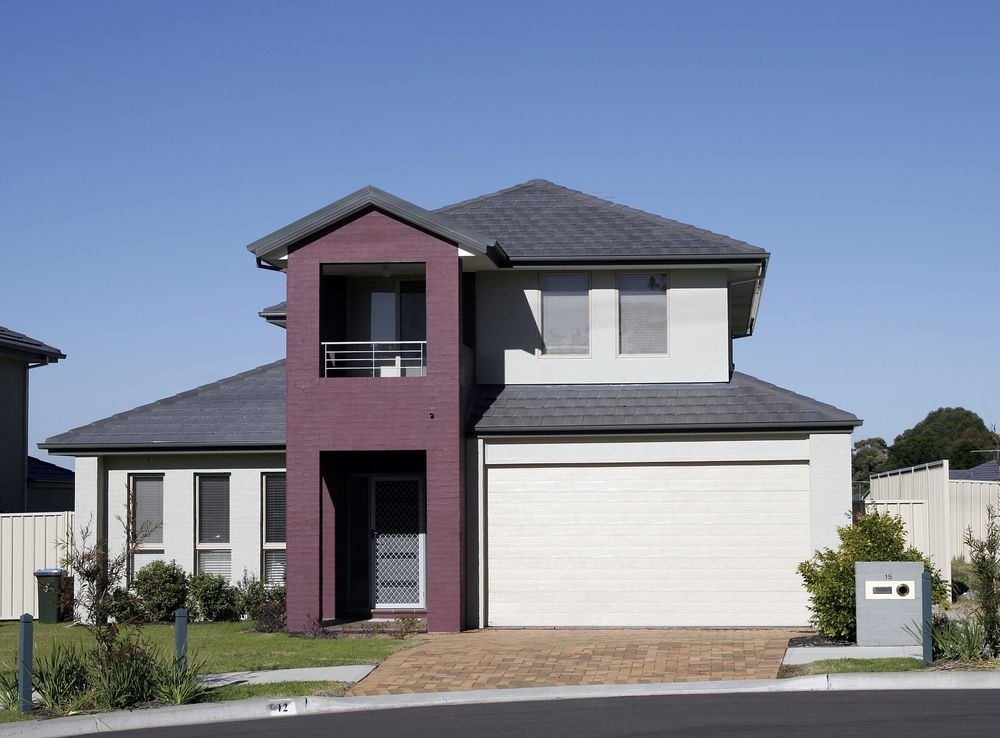 A Purple And White House With A White Garage Door — Settle Petal Mobile Conveyancing In Nabiac, NSW