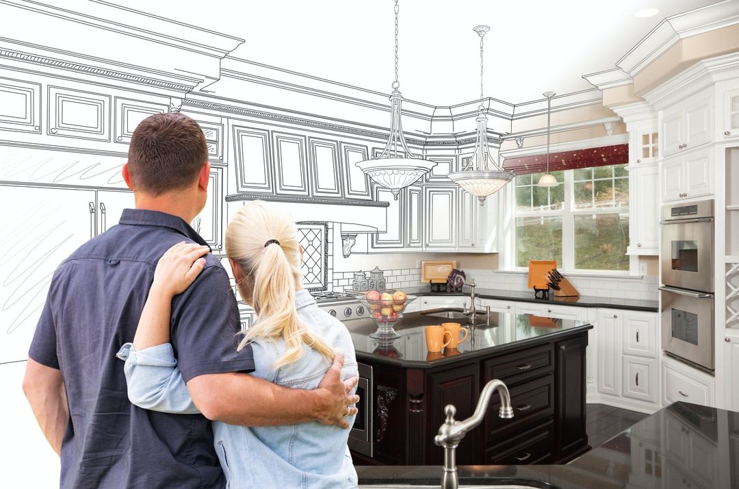 Couple designing kitchen