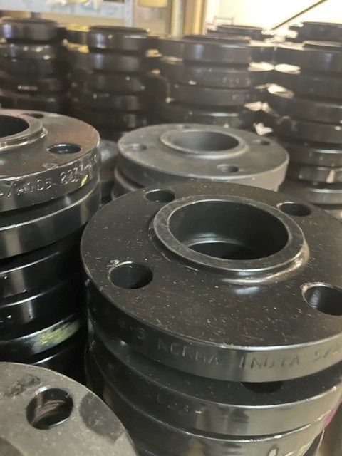 A bunch of metal hydraulics are stacked on top of each other