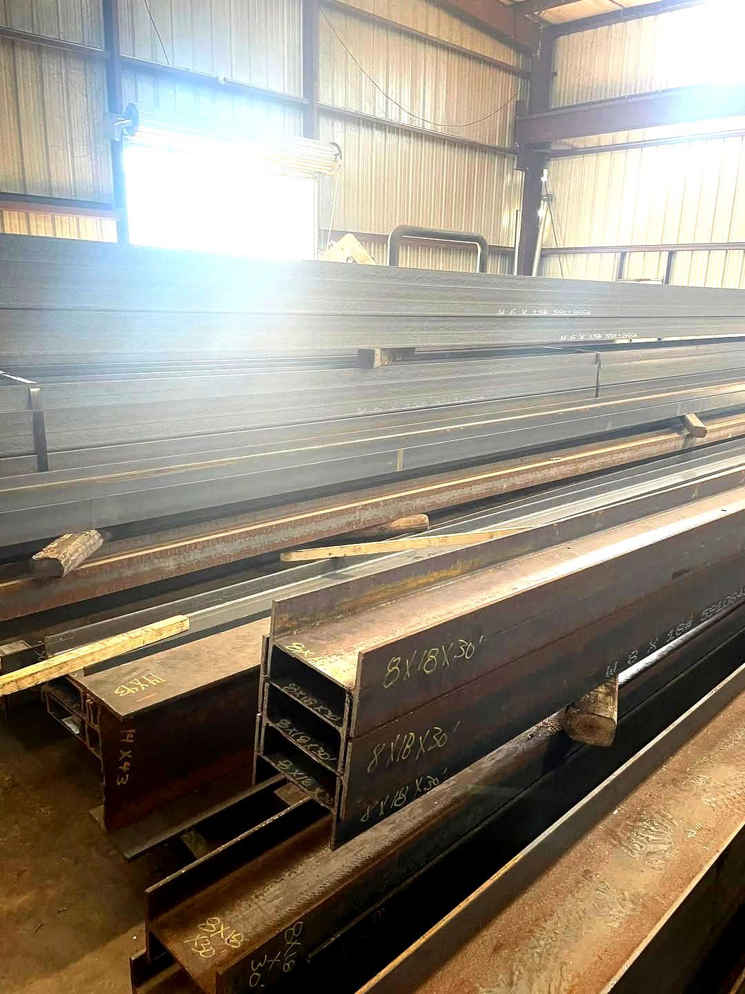 A large warehouse filled with lots of metal pieces.