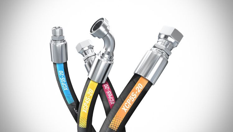 Three hydraulic hoses are stacked on top of each other on a white background.