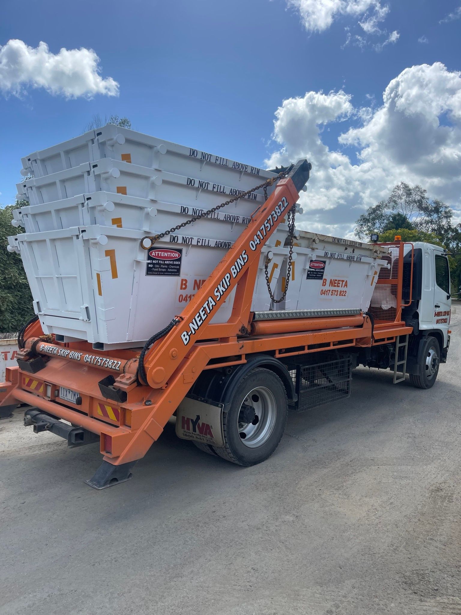 Different Size of B-Neeta Skip Bins Colour White and a Service Truck | Warragul, Vic | B-Neeta Skip Bins