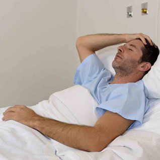 Person in hospital bed image