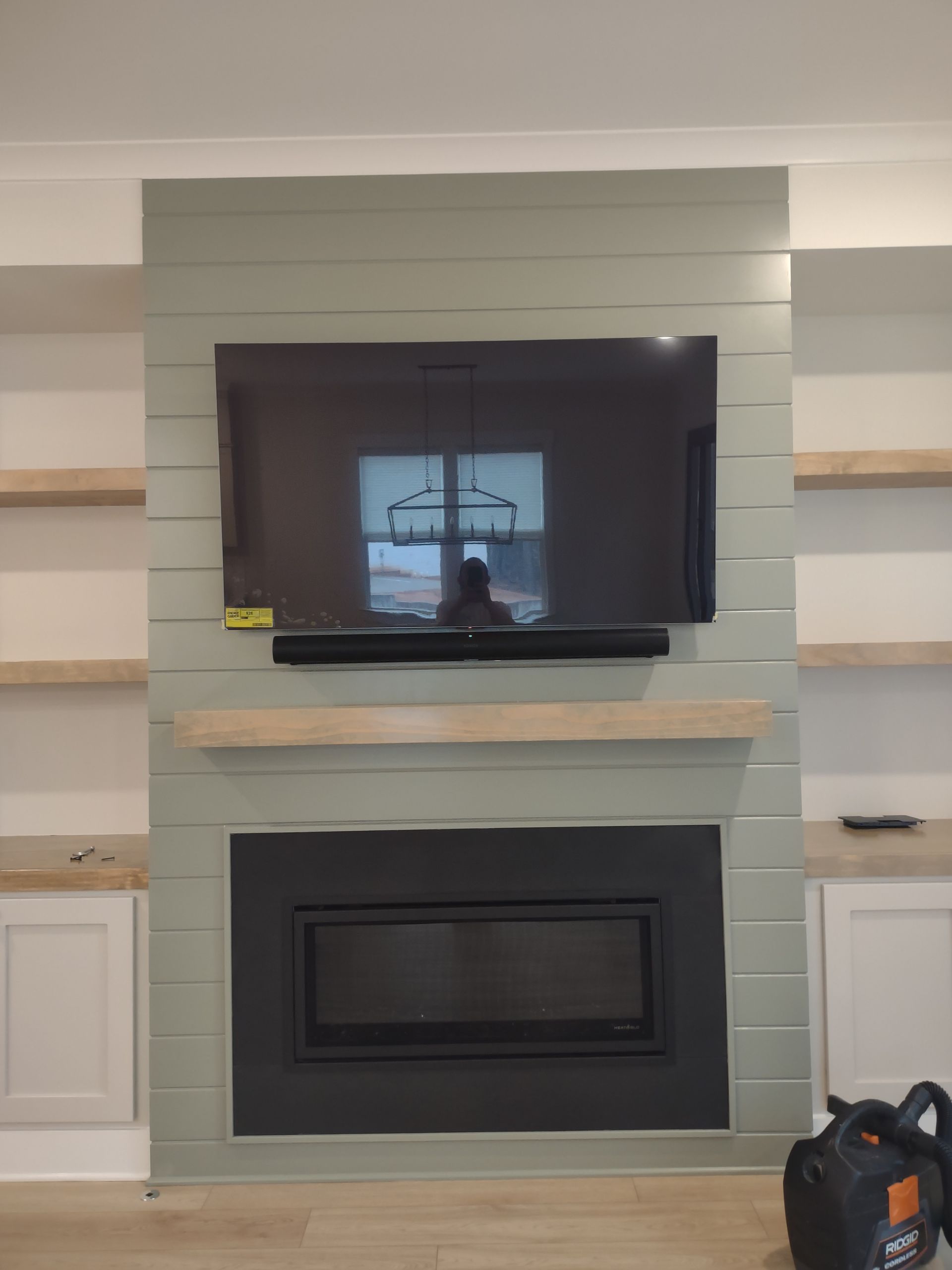 Above fireplace TV mount