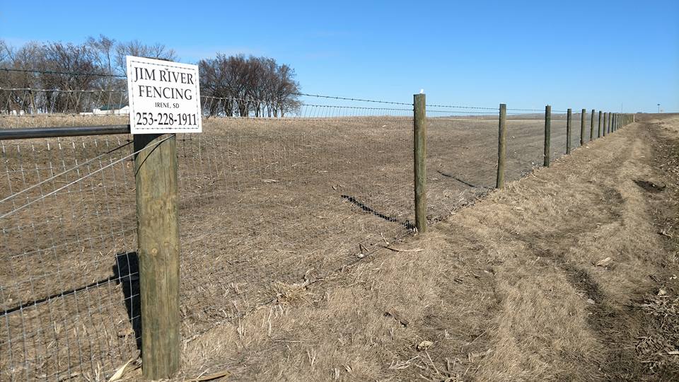 Barbed wire fence in a remote area — fencing in Volin, SD